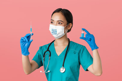 Face Mask Mockup of a Female Nurse Holding a Vaccine