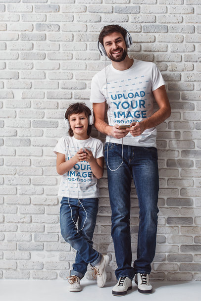 Round-Neck T-Shirt Mockup of a Father and Son Listening to Music