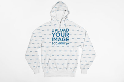 Mockup of a Pullover Hoodie Lying on a Flat Surface