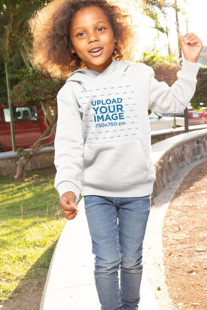 Pullover Hoodie Mockup of a Girl with Natural Hair at a Park