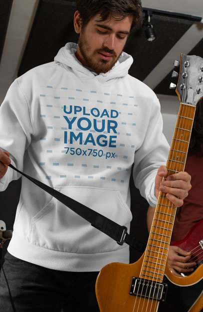 Mockup of a Guitarist Wearing a Pullover Hoodie