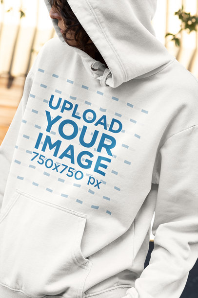 Hoodie Mockup of a Curly Haired Woman Looking Back