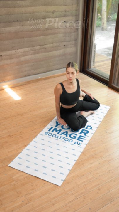 Yoga Mat Video of a Serious Fitness Woman Stretching for a Wellness Class