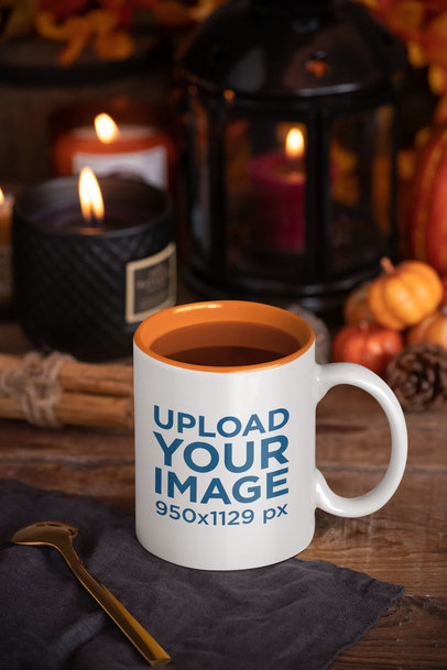 Mockup of an 11 oz Coffee Mug with Fall Decorations in the Background