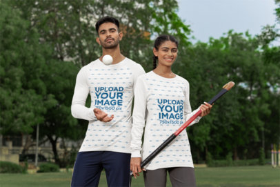 Bella Canvas Long Sleeve T-Shirt Mockup of a Man and a Woman on a Cricket Field