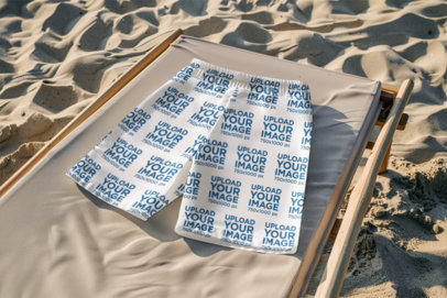 Mockup Featuring a Pair of Swim Trunks on a Beach Chair