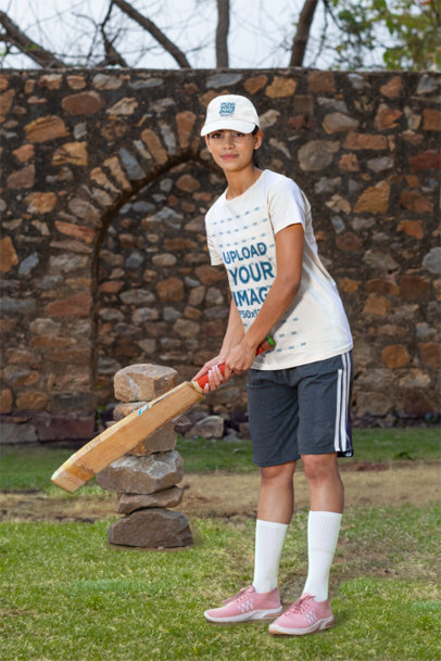 Mockup of a Female Cricket Player Wearing a Dad Hat and a T-Shirt