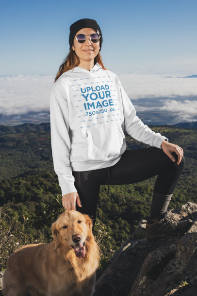 Pullover Hoodie Mockup Featuring a Woman Hiking with Her Dog