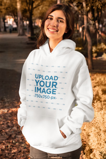 Mockup of a Woman Wearing a Pullover Hoodie in Fall