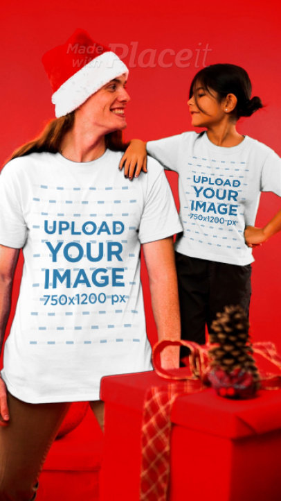 T-Shirt Video of a Man and a Little Girl in Christmas Outfits