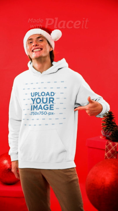 Christmas-Themed Video of a Smiling Man with a Pullover Hoodie Holding a Gift Bag